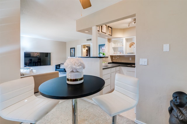 dining space featuring carpet floors