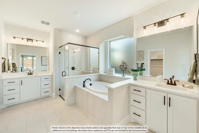 bathroom with vanity, shower with separate bathtub, and tile patterned floors