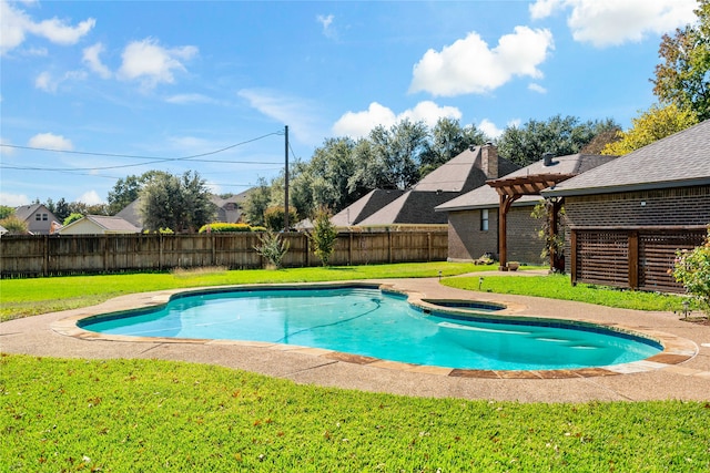 view of pool featuring a jacuzzi and a lawn