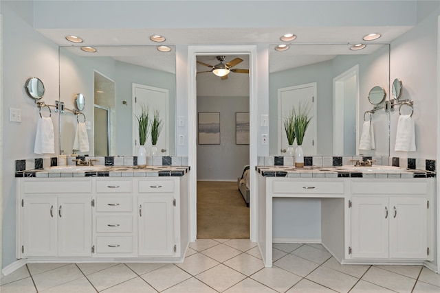 bathroom featuring vanity, tile patterned floors, walk in shower, and ceiling fan