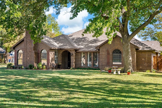 tudor house with a front lawn