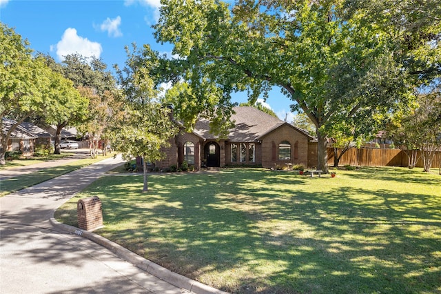 view of front of house with a front lawn