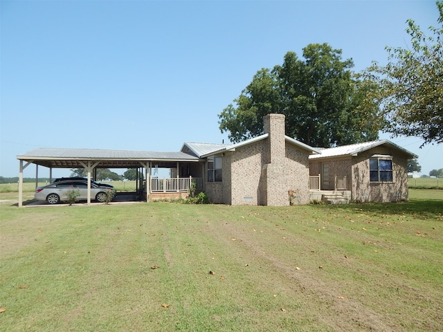 view of yard featuring a carport