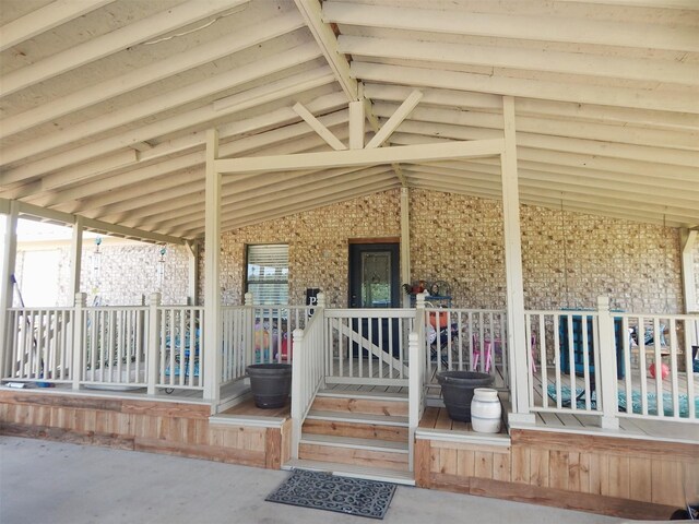 entrance to property featuring covered porch