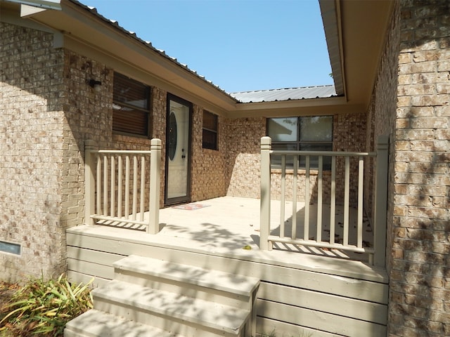 wooden deck featuring covered porch