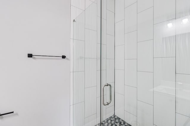 bathroom featuring an enclosed shower