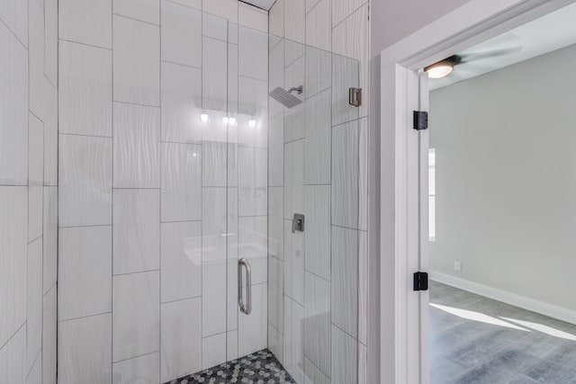 bathroom featuring an enclosed shower