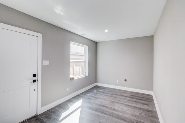 foyer entrance with wood-type flooring