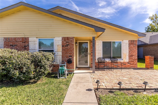 view of front of house with a patio