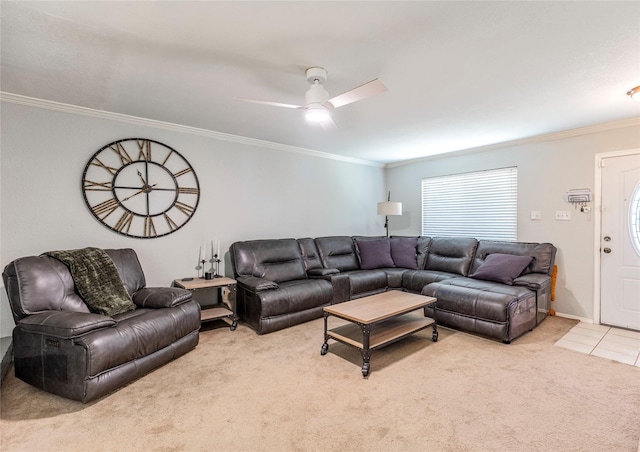 carpeted living room featuring ceiling fan and ornamental molding