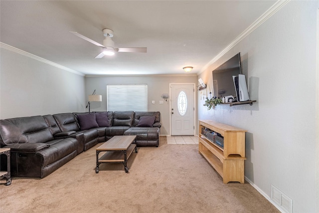 living room featuring light carpet, ceiling fan, and crown molding