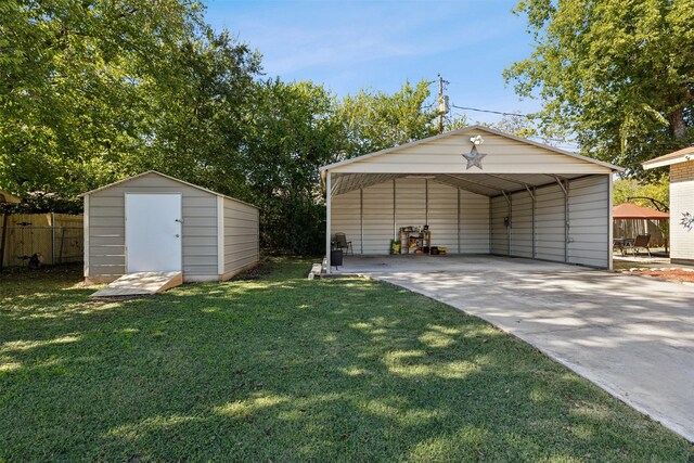 view of outbuilding featuring a lawn and a carport