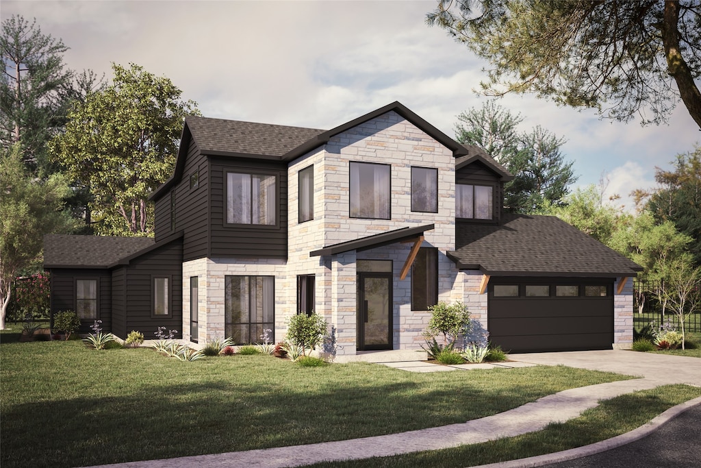 view of front of house with a garage and a front yard