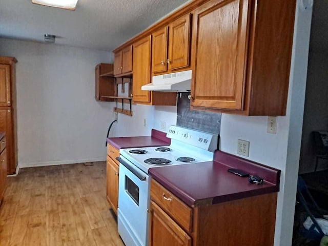 kitchen with decorative backsplash, white range with electric stovetop, a textured ceiling, and light hardwood / wood-style flooring