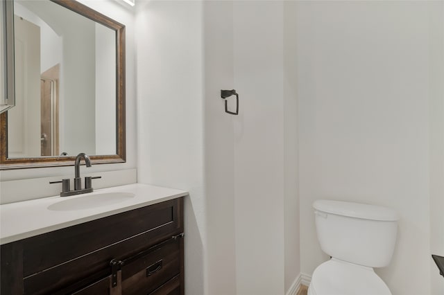 13647 Monstrell Rd, Frisco, TX 75035 - bathroom featuring toilet, vanity, and an enclosed shower
