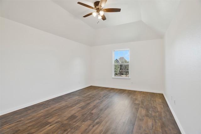 unfurnished room with ceiling fan, dark hardwood / wood-style floors, and vaulted ceiling