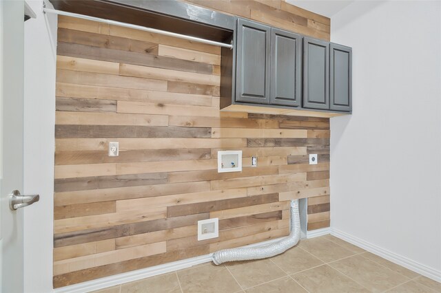 room details with wood walls and tile patterned floors