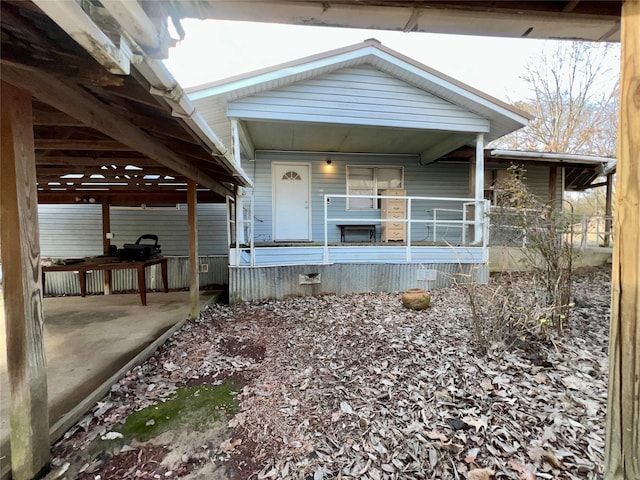 entrance to property with covered porch