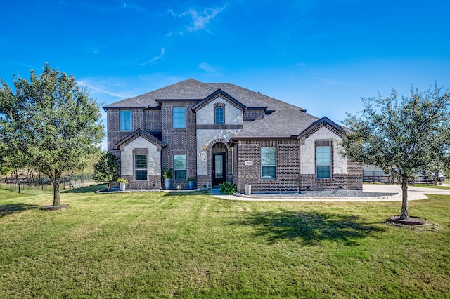 view of front of house with a front lawn