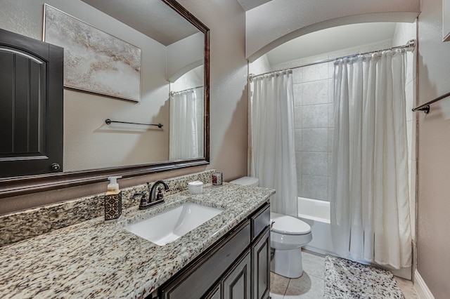 full bathroom with shower / tub combo with curtain, vanity, toilet, and tile patterned flooring