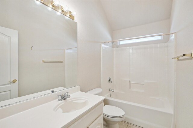 full bathroom featuring tile patterned flooring, shower / washtub combination, toilet, and vanity