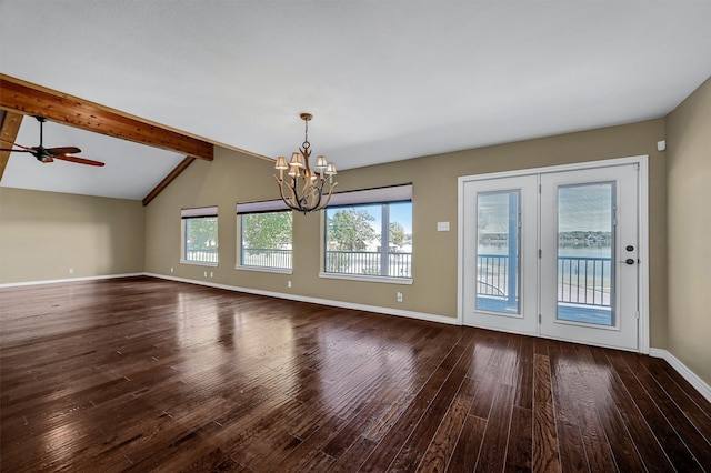 interior space with dark hardwood / wood-style floors, ceiling fan with notable chandelier, and lofted ceiling with beams