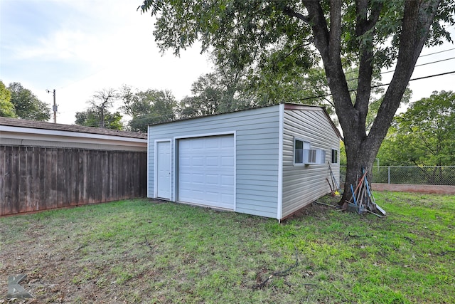 garage with a yard