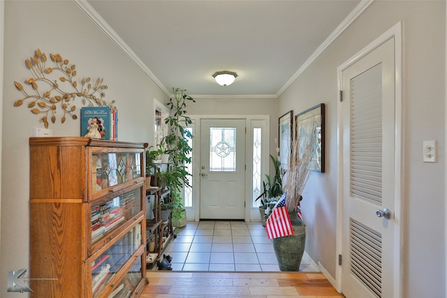 entryway featuring light hardwood / wood-style floors and crown molding