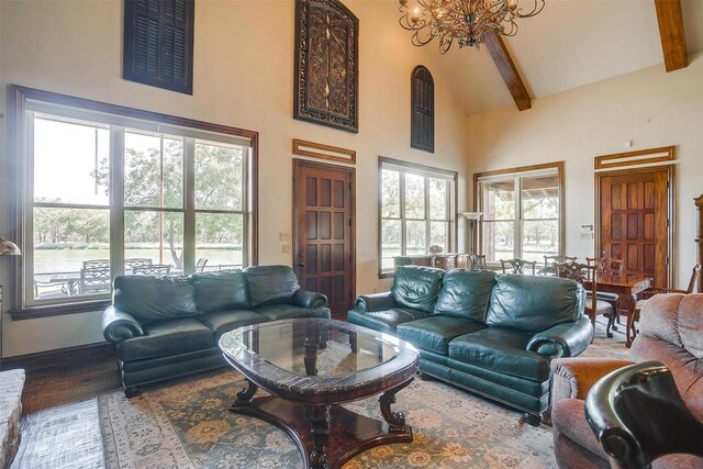 living room with hardwood / wood-style flooring, beamed ceiling, high vaulted ceiling, and a notable chandelier