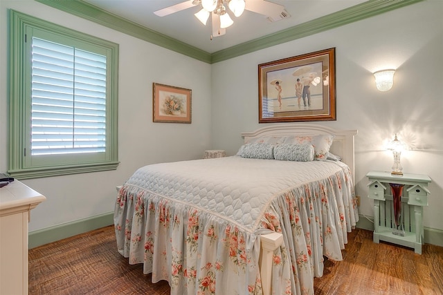 bedroom with wood-type flooring, ceiling fan, and crown molding