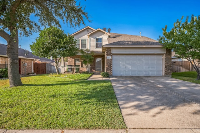 view of front of house featuring a garage and a front yard