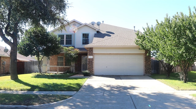 view of front facade featuring a garage and a front lawn