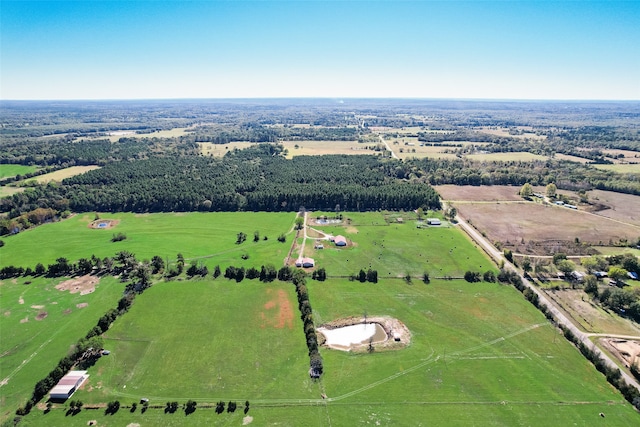 birds eye view of property with a rural view