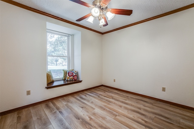 empty room with crown molding, light wood-type flooring, a textured ceiling, and ceiling fan