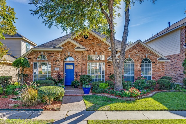 view of front property with a front lawn