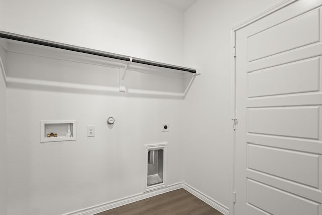 laundry area featuring hookup for a washing machine, dark hardwood / wood-style floors, hookup for a gas dryer, and electric dryer hookup