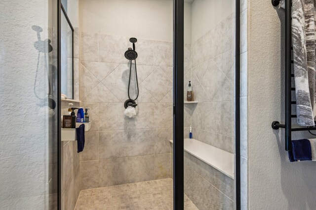 bathroom featuring an enclosed shower