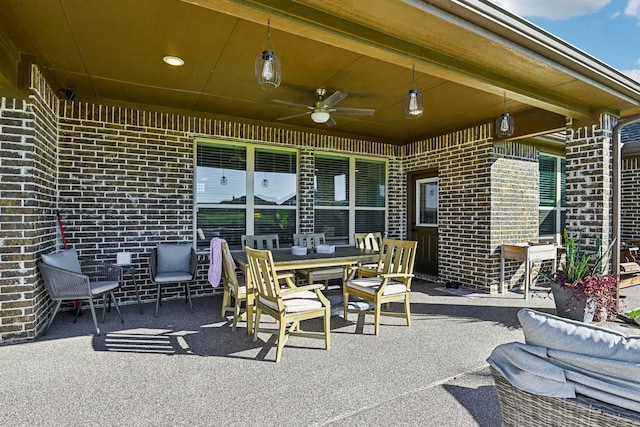 view of patio / terrace featuring ceiling fan