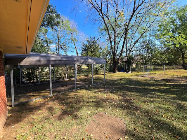 view of yard featuring a carport