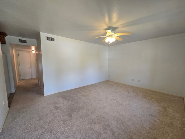 empty room with light carpet and ceiling fan