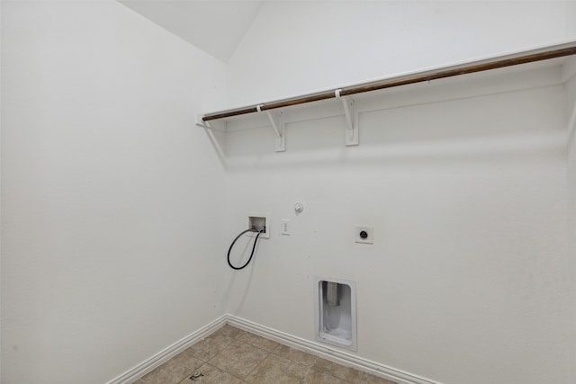 washroom with gas dryer hookup, washer hookup, light tile patterned floors, and electric dryer hookup