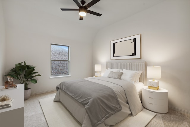 carpeted bedroom featuring lofted ceiling and ceiling fan