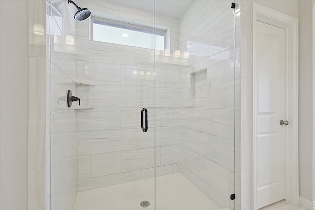 bathroom with an enclosed shower