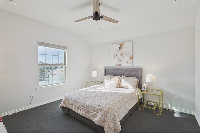 carpeted bedroom with ceiling fan and lofted ceiling