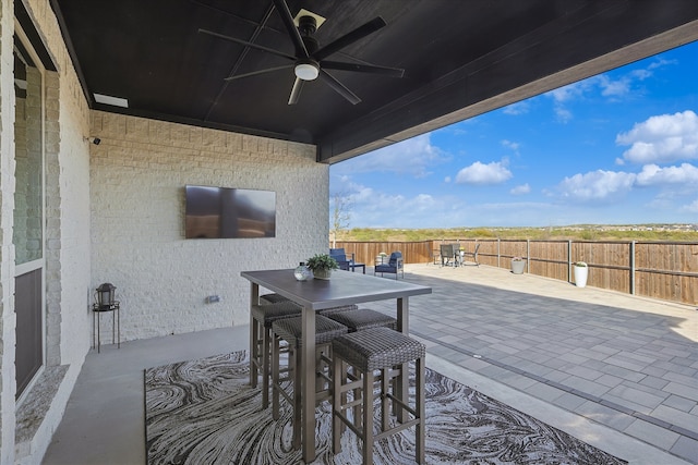 view of patio with ceiling fan