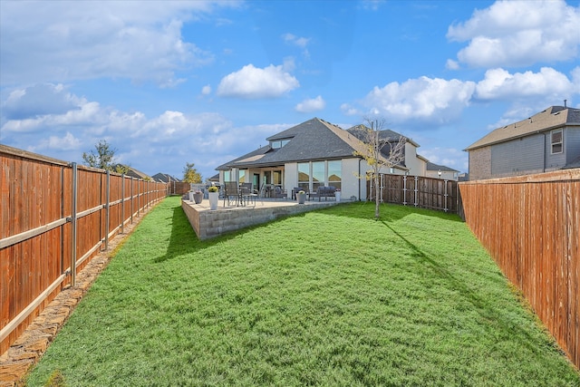 view of yard with a patio area