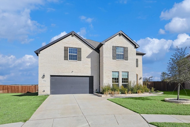 front of property with a front lawn and a garage