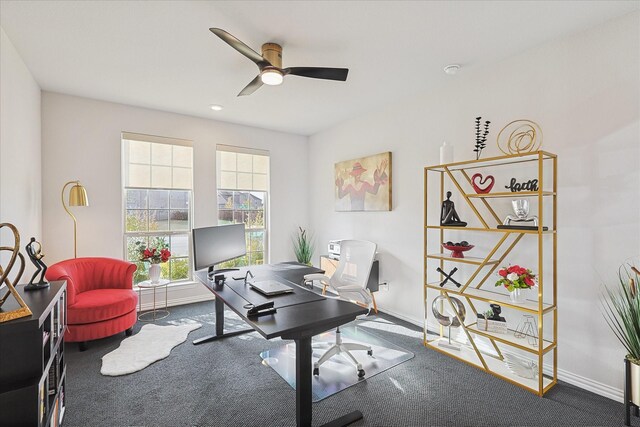 home office featuring carpet and ceiling fan