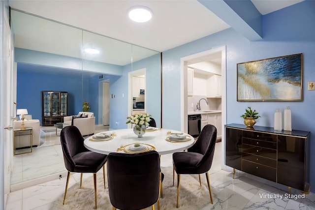 dining area with marble finish floor