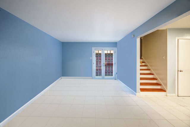 empty room featuring french doors